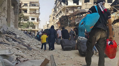 civiles abandonan Alepo oriental